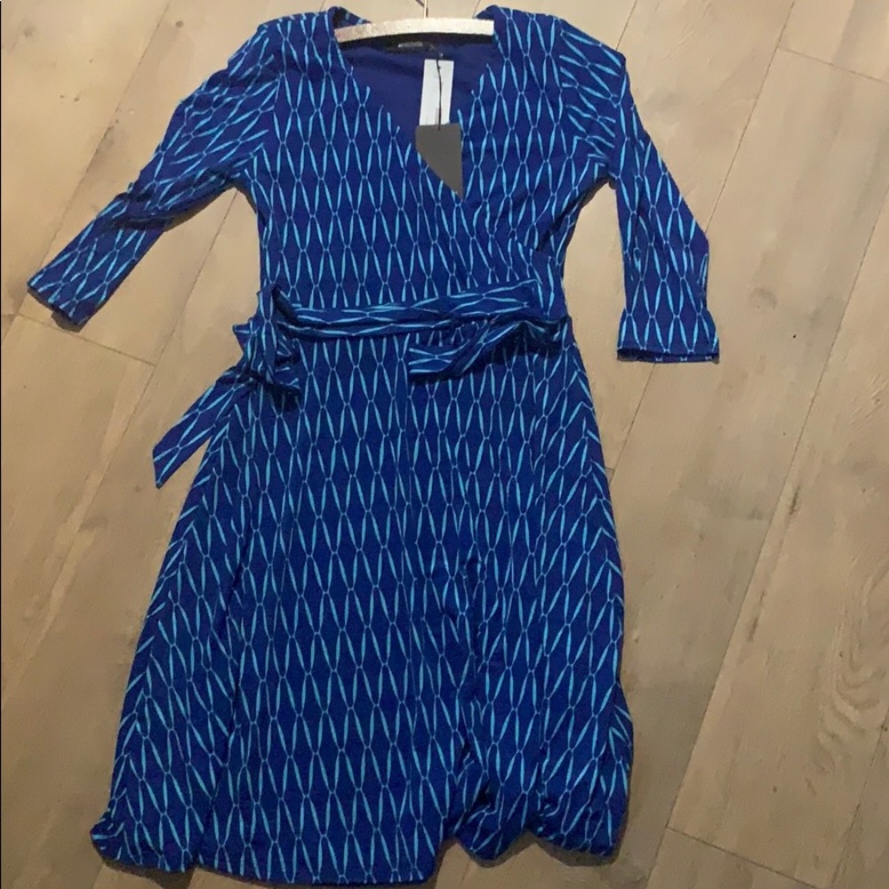 Never worn. Blue/Teal dress